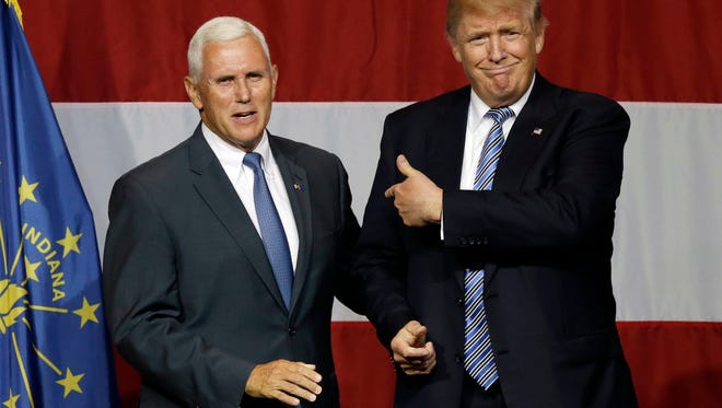 Indiana Gov. Mike Pence joins Republican presidential candidate Donald Trump at a rally in Westfield, Indiana, on July 12.