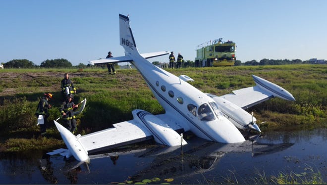Plane lands in ditch at Orlando Executive Airport.