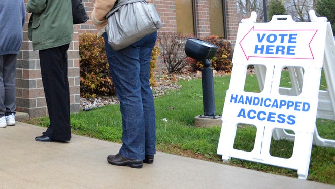 The man caused problems at polling places in Green Bay and Ashwaubenon on Tuesday.