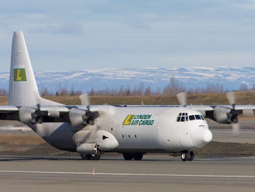 A Lynden Air Cargo C-130 Hercules lands at Anchorage