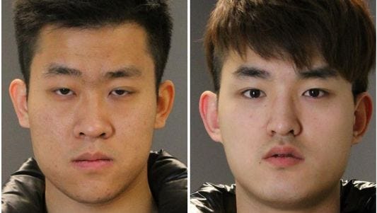 Meng Long Li, left, and Shan Gao are standing trial on assault charges.