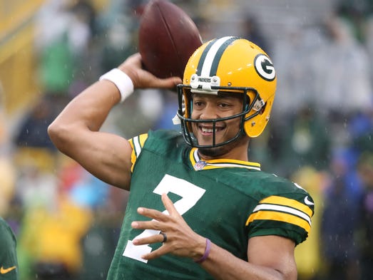 Green Bay Packers quarterback Brett Hundley (7) smiles