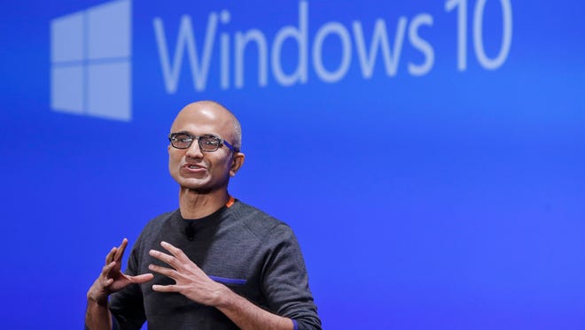 n this Jan. 21, 2015, file photo, Microsoft CEO Satya Nadella speaks at an event demonstrating the new features of Windows 10 at the company's headquarters in Redmond, Wash. (AP Photo/Elaine Thompson, File)