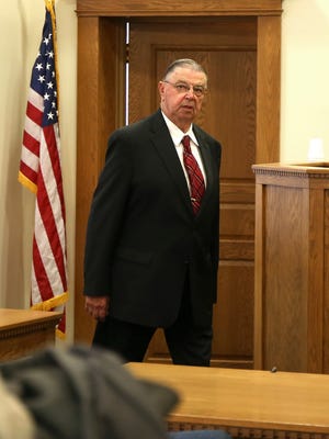 Henry Rayhons leaves the courtroom at the Hancock County Courthouse in Garner, Iowa, on Tuesday, April 21, 2015, after the jury did not return with a verdict. Rayhons, 78, was charged with felony sexual assault for allegedly having sex with his wife, who had been suffering with Alzheimer's disease and was unable to give consent.