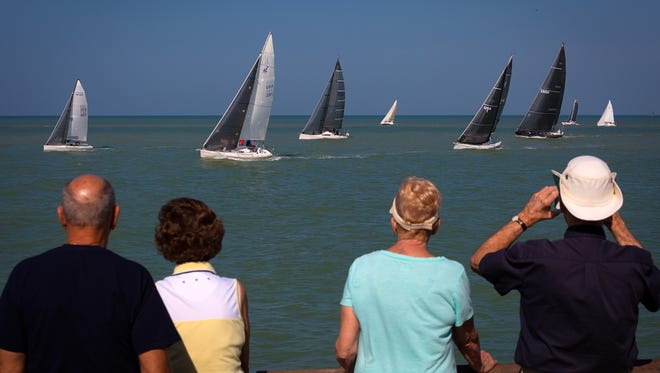 Participants sail in the 40th annual Southwest Florida Charity Regatta of the Gulf Coast Sailing Club in the Gulf of Mexico near the Naples pier on Saturday, April 2. 2016, in Naples.  (David Albers/Staff)