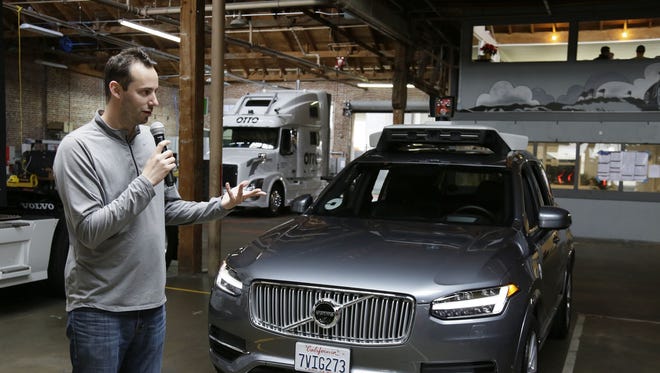 In this Dec. 13, 2016, file photo, Anthony Levandowski, head of Uber's self-driving program, speaks about their driverless car in San Francisco.
