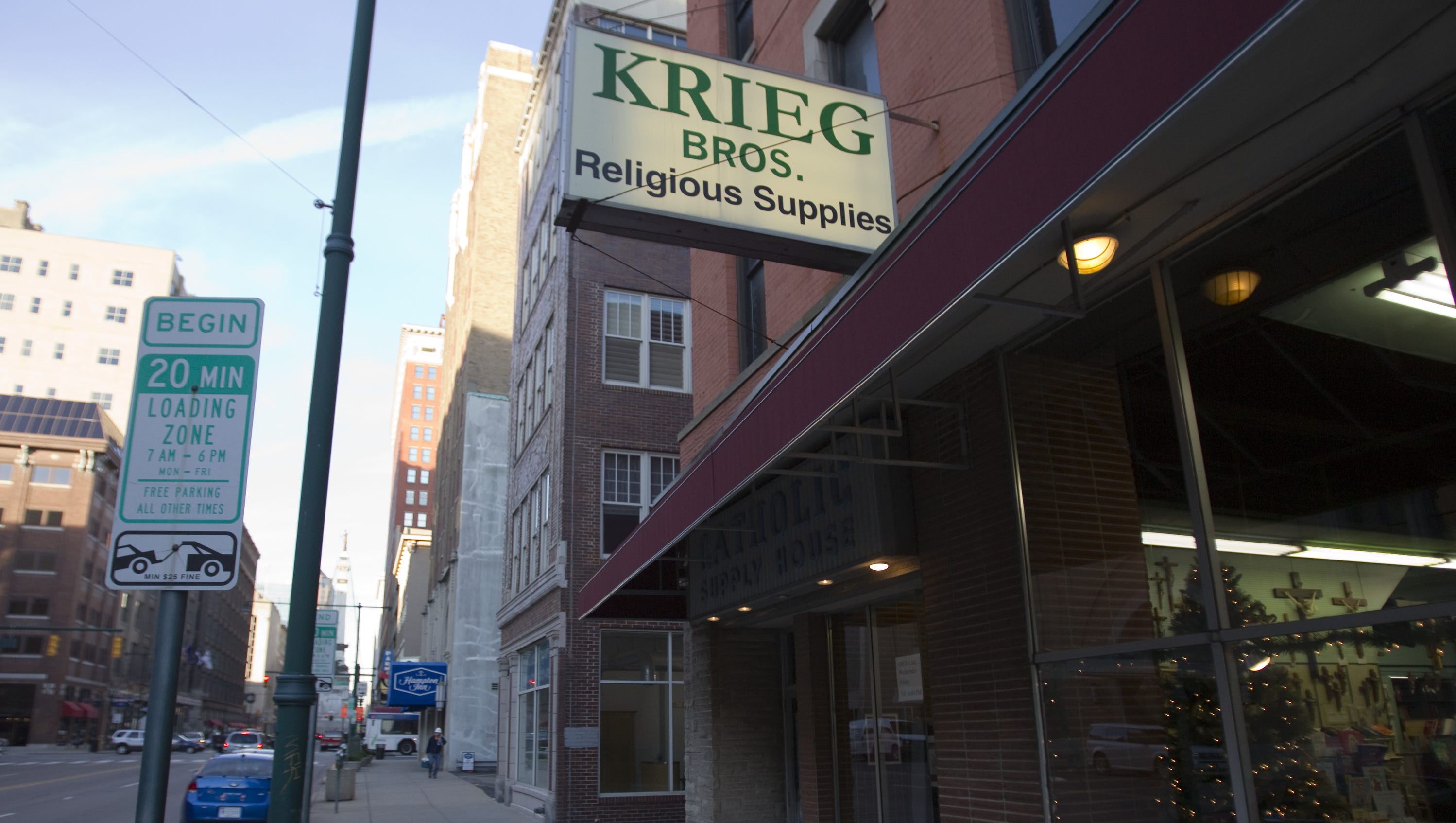 Krieg Religious Supply opens in new spot as old building is demolished