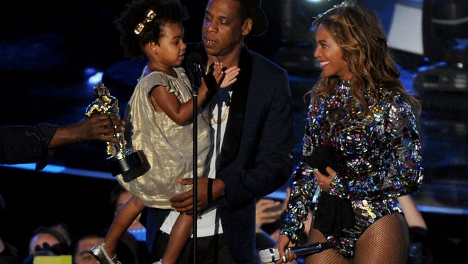 LOS ANGELES, CA - AUGUST 24 : (L-R) Blue Ivy, Jay Z and Beyonce onstage at the 2014 MTV Video Music Awards at The Forum on August 24, 2014 in Los Angeles, California. fmpg/MediaPunch/IPX