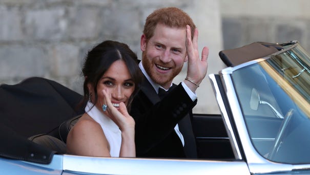 The newly married Duke and Duchess of Sussex,...