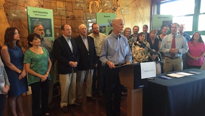 Gov. Rick Scott stopped by Corkscrew Swamp Sanctuary today for a ceremony to sign a bill dedicating up to $200 million annually for Everglades restoration.