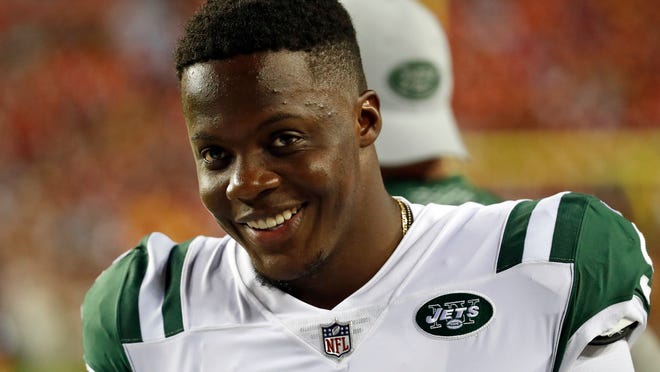 New York Jets quarterback Teddy Bridgewater (5) smiles on the sidelines during the first half of a preseason NFL football game against the Washington Redskins, Thursday, Aug. 16, 2018, in Landover, Md. (AP Photo/Alex Brandon)