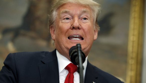 President Donald Trump speaks before signing an executive