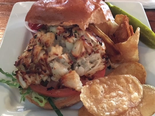 Jennifer Eisenhauer of Middletown loves the crab cakes at Woody's Dewey Beach Bar & Grill so much, she sent us a photo. She wrote 'my first crab cake sandwich from Woody's. One photo that will always be in my photo album to show and share with people I meet.'