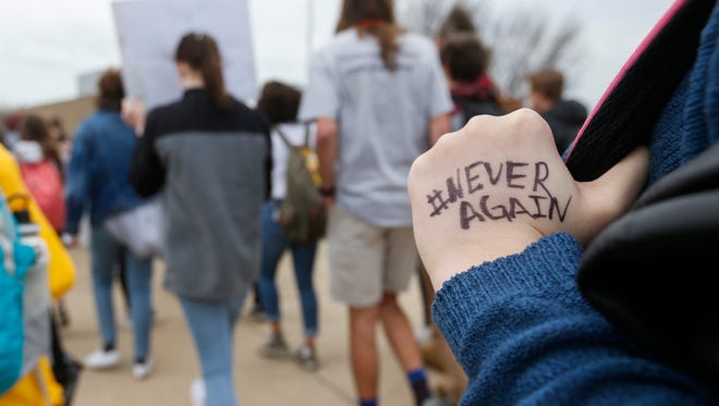 At least 300 students at Kickapoo High School walked out of class at 10:30 a.m. on Friday, March 23, 2018 in response to the fatal school shooting in Parkland, Florida and to raise awareness to gun violence. About 40 students rallied in front of the school to show their support for the 2nd Amendment.   