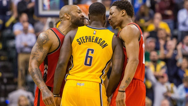 Toronto Raptors forward PJ Tucker (2) and guard DeMar DeRozan (10) get into an altercation with Indiana Pacers guard Lance Stephenson (6) in the second half of the game at Bankers Life Fieldhouse. The Pacers beat the Raptors 108-90 on April 4.