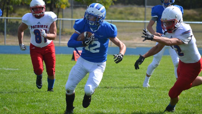 Inland Lakes senior defensive back Derick Armstrong (12) earned a spot on the Associated Press' 8-Player All-State football first team.