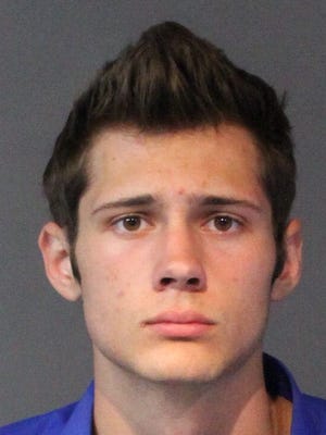 Jordan Tyler Davis, 18, was sentenced to 18 years in prison for multiple burglaries and home invasion.