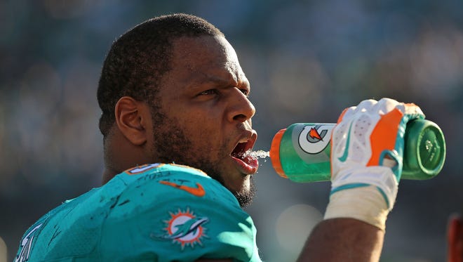 Ndamukong Suh #93 of the Miami Dolphins looks on during a game against the Jacksonville Jaguars at EverBank Field on September 20, 2015 in Jacksonville, Florida.