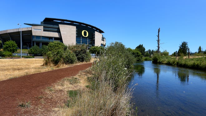 Pre's Trail, bottom left, runs along the Canoe Canal, right, and along the south side of Autzen Stadium at Alton Baker Park, Friday, July 24, 2015, in Eugene, Ore.