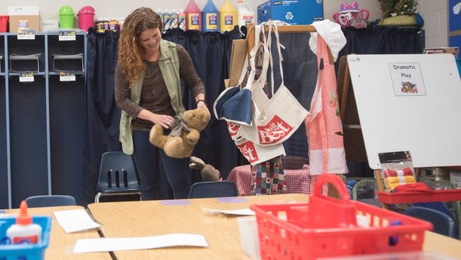 Zane Trace pre-school teacher Carly Joseph arranges the props for the new drama section of her classroom. “I am ready and really excited for the first year in my first full time teaching position,” said Joseph, who was previously a substitute teacher and student at Zane Trace. 