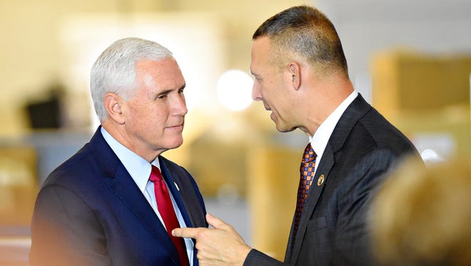 U.S. Vice President Mike Pence, left, and U.S. Representative Scott Perry during Pence's visit to Military & Commercial Fasteners Corporation in Manchester Township, Saturday, Nov. 4, 2017. Dawn J. Sagert photo