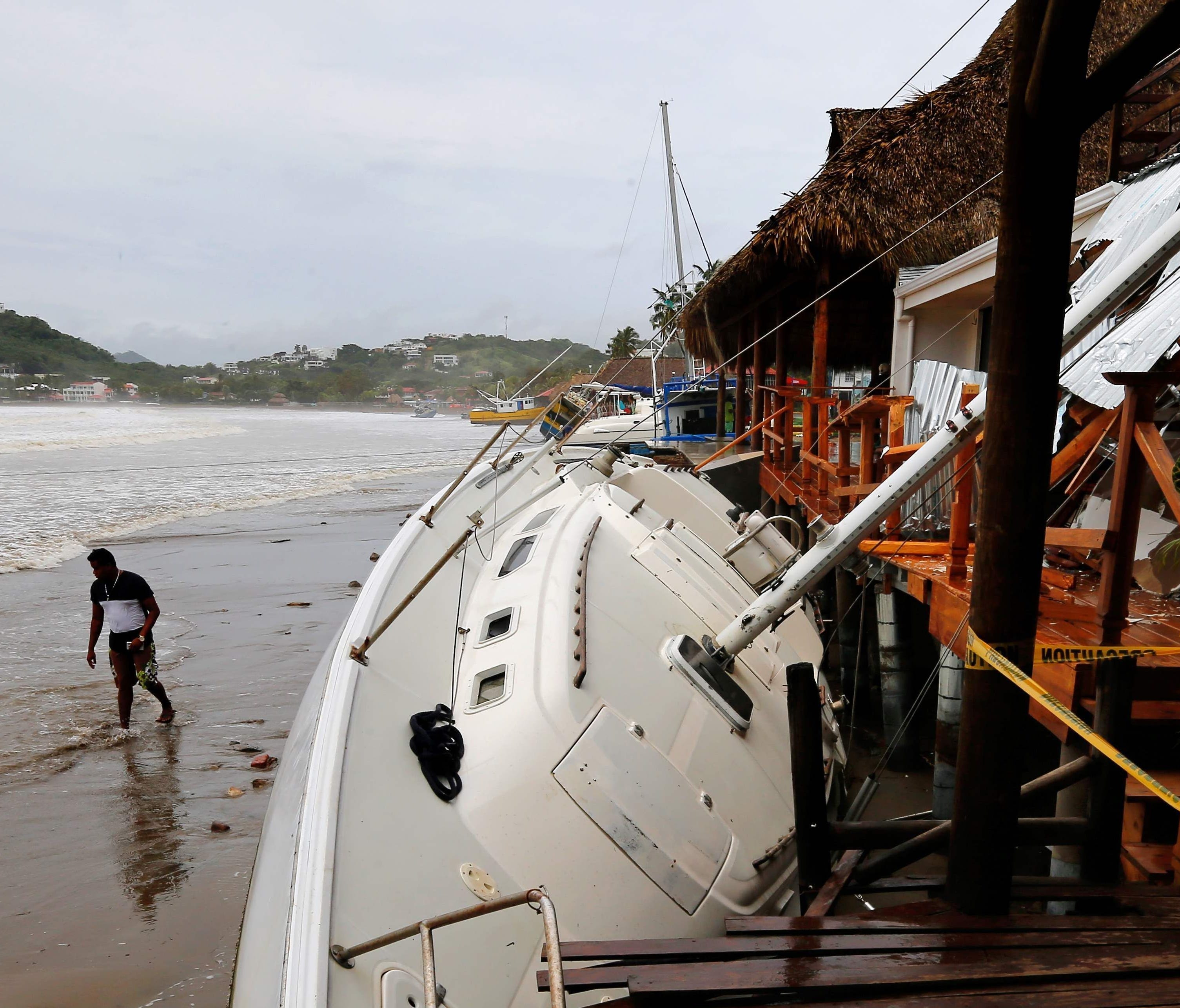View of damages in San Juan del Sur beach, following the passage of Tropical Storm Nate, in Rivas, Nicaragua, on Friday. Tropical Storm Nate gained strength as it headed toward popular Mexican beach resorts and ultimately the Gulf coast after dumping