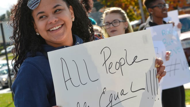 Shanelle DeShields, 17, a senior at Central York High School, joins community members and students at a rally to draw awareness to alleged racial bullying at York County School of Technology, Friday, Nov. 11, 2016. DeShields said she was a student at York Tech but left last year after being racially bullied.  John A. Pavoncello photo
