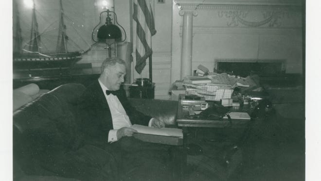 President Franklin D. Roosevelt works in the study around the time of the attack on Pearl Harbor. The war years and how they affected Hyde Park will be the topic of a "Fireside Chat" Feb. 2.