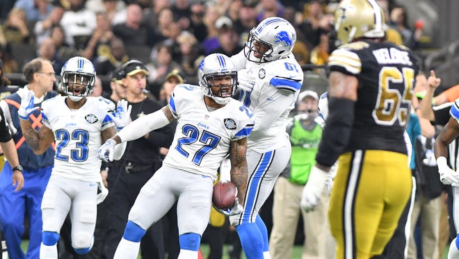 Lions safety Glover Quin (27) Quin said using his platform to improve society for his three young children is his primary motivation.