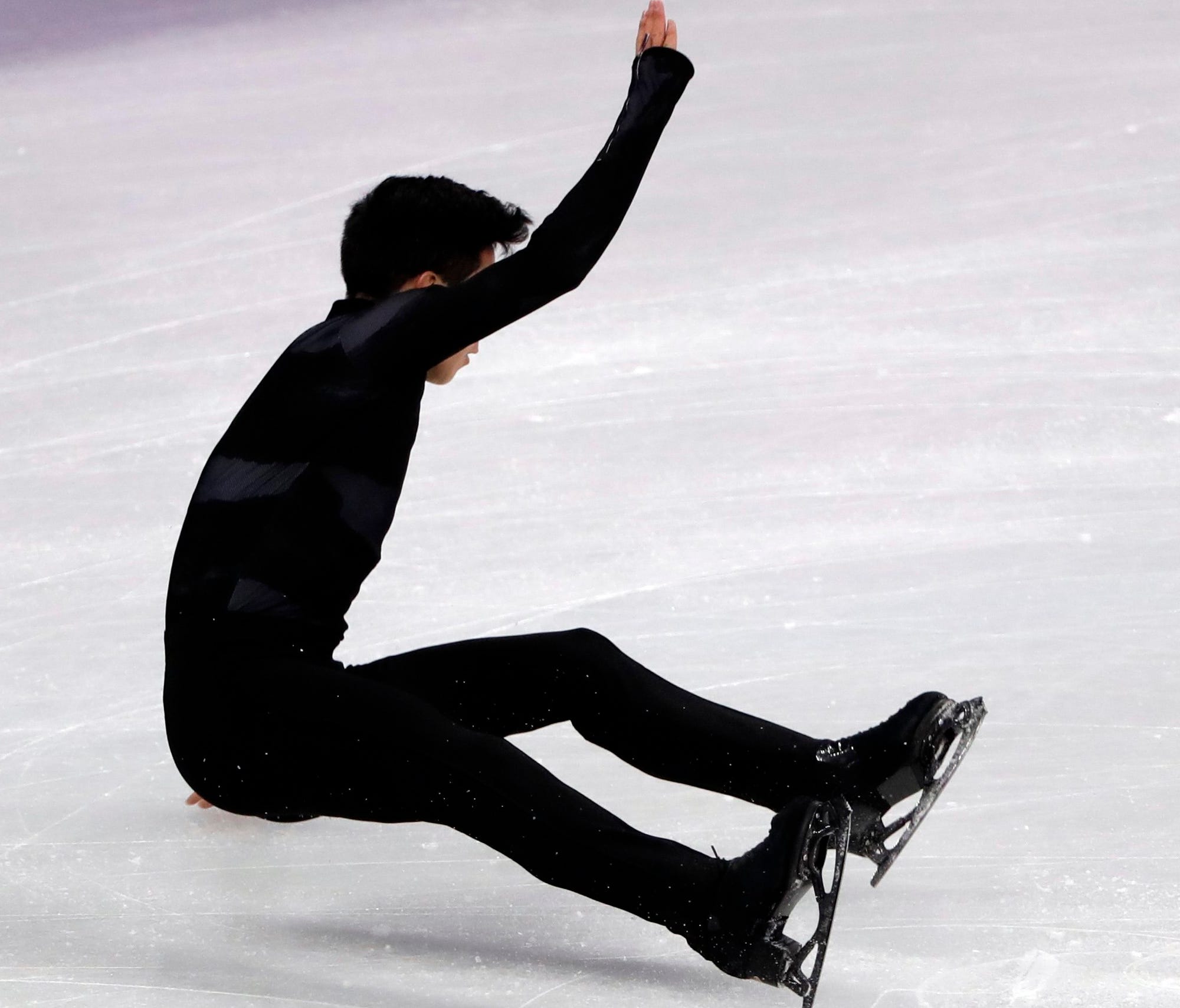 United States' Nathan Chen falls in the men's single short program team event at the 2018 Winter Olympics in Gangneung, South Korea, Friday.