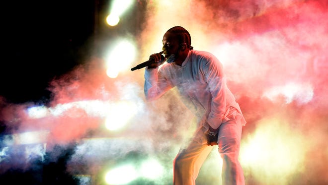 INDIO, CA - APRIL 16:  Rapper Kendrick Lamar performs on the Coachella Stage during day 3 of the Coachella Valley Music And Arts Festival (Weekend 1) at the Empire Polo Club on April 16, 2017 in Indio, California.  (Photo by Kevin Winter/Getty Images for Coachella)