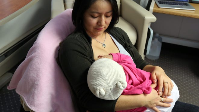 Digna Chalco of Spring Valley breastfeeds her daughter, Linda Zuna, 6 months, at the Rockland County Womens Health office in Spring Valley Jan. 31, 2017. Chaco helps mothers who visit the center learn about breastfeeding.