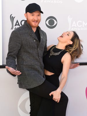 Eric Paslay with his wife Natalie Harker during the 52nd Academy of Country Music Awards red carpet at T-Mobile Arena on Sunday, April 2, 2017, in Las Vegas, Nev.