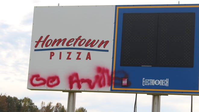 McNairy Central's scoreboard that has been vandalized with "Go A-ville"