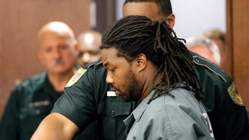 Jesse Leroy Matthew Jr. is escorted into a courtroom for an appearance before 405th District Court Judge Michelle Slaughter regarding his extradition back to Virginia, Thursday, Sept. 25, 2014, in Galveston, Texas. Matthew was arrested on a beach in the Texas community of Gilchrist by Galveston County Sheriff's authorities Wednesday night, Sept. 24, 2014. He is charged with abducting missing University of Virginia sophomore Hannah Graham and is awaiting extradition. (AP Photo/David J. Phillip)