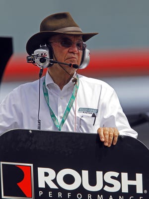 Team owner Jack Roush watches from a car hauler during practice for a NASCAR Xfinity Series auto race at Bristol Motor Speedway on Friday, April 17, 2015, in Bristol, Tenn.