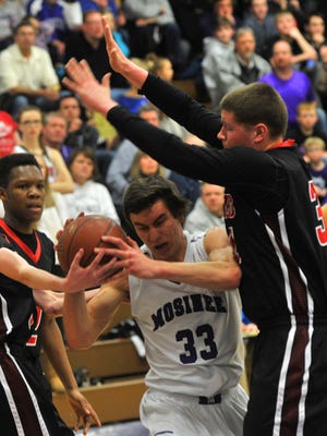 Jared Novitzke, center, is averaging 8.4 points per game this season for the Great Northern Conference-leading Mosinee boys basketball team.