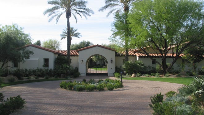 Christopher and Irene Biggs paid $3.6 million for this 7,223 square-foot house in Paradise Valley.