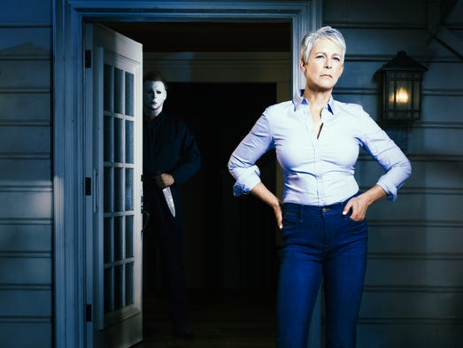 Jamie Lee Curtis and masked villain Michael Myers share