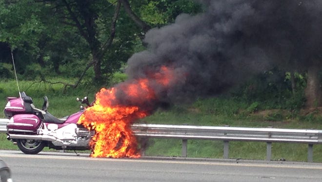 A motorcycle fire closes lanes on northbound I-95 at Del. 141 Thursday afternoon.