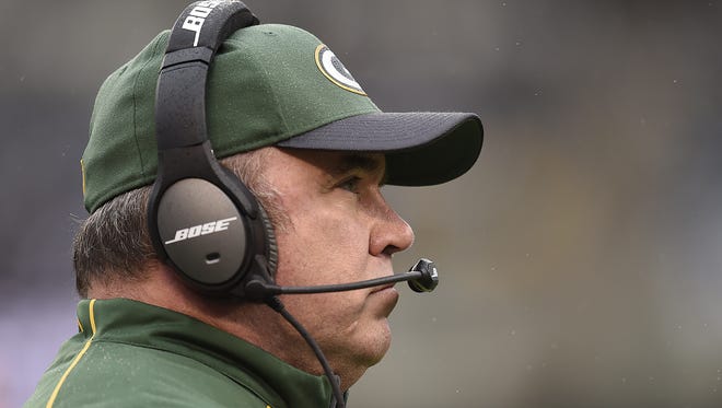 Green Bay Packers coach Mike McCarthy looks on during a game against the Oakland Raiders.