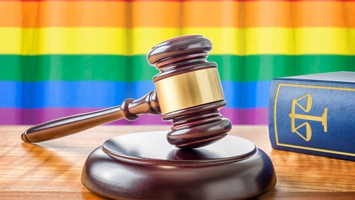 Gavel and a law book - Rainbow flag
