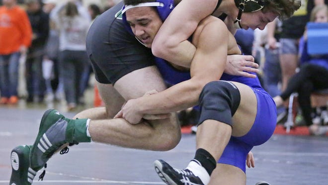 Wrightstown's Bryce Herlache, bottom, is one of four wrestlers at the WIAA Division 2 Denmark regional ranked No. 1 in their weight class by WIWrestling.com.