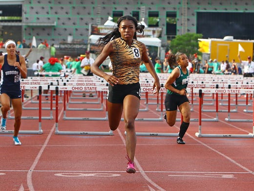 Withrow's J'Alyiea Smith wins her heat in the 100 meter