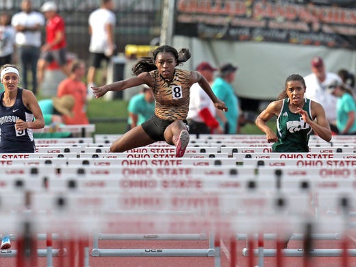 Withrow's J'Alyiea Smith wins her heat in the 100 meter