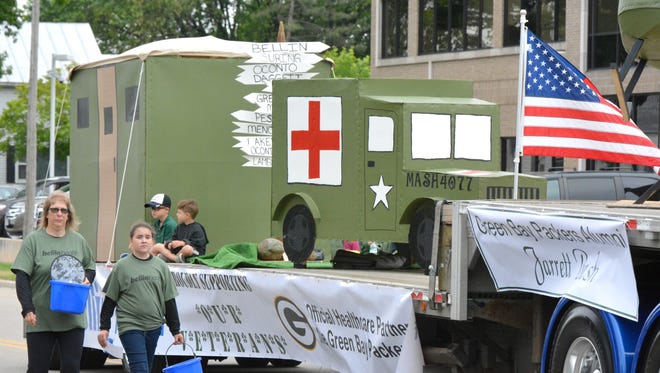 The television show "MASH" was the theme of the Bellin Health float, which won first place in the Oconto Copperfest Parade on June 9. The "Cheers" float came in second place, with Pure Romance by Janet Van's Sex in the City float in third.