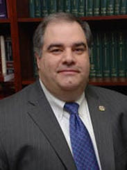 Philip James Degnan, executive director of the State