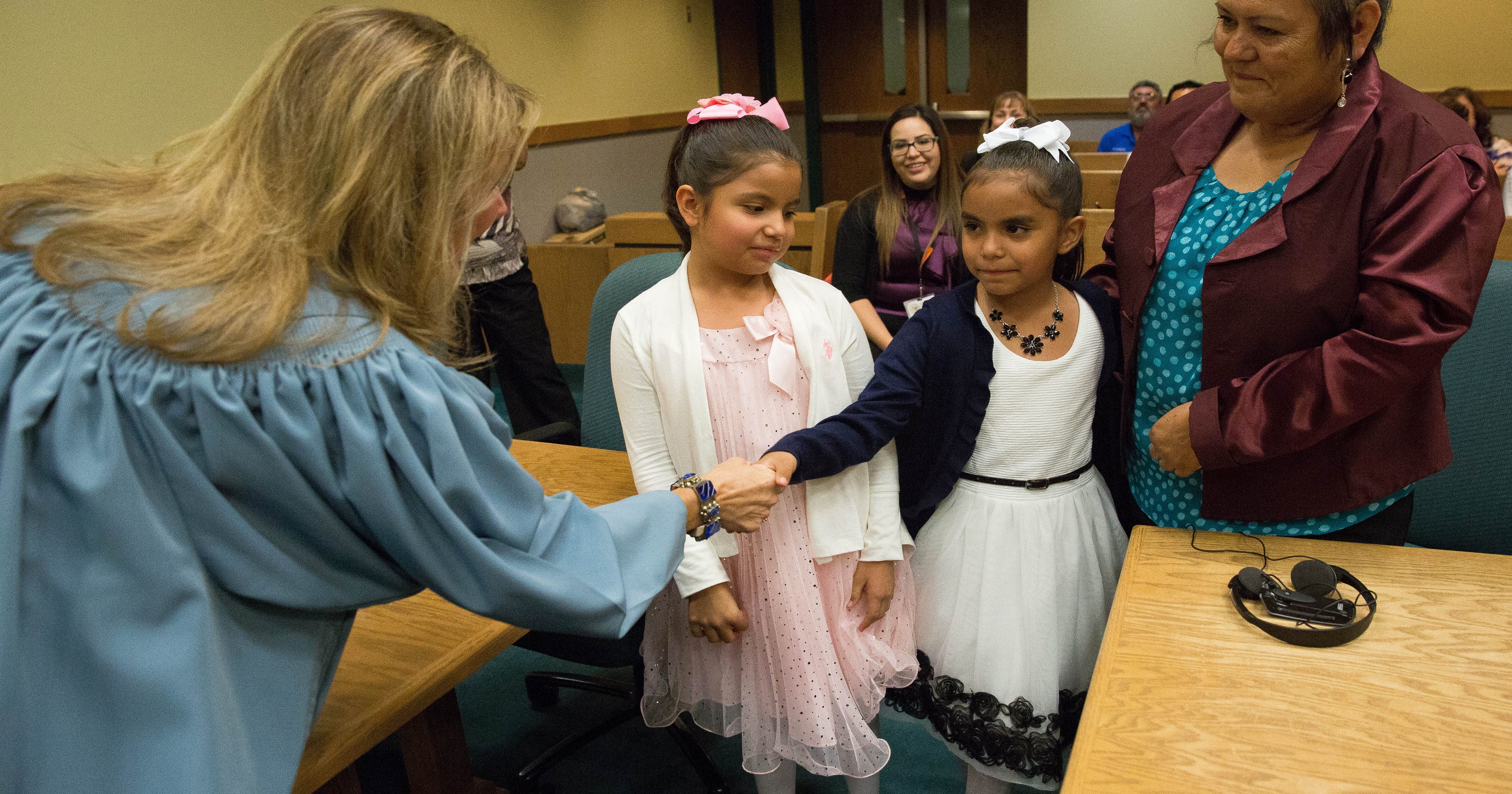 Family adopts twins as part of adoption celebration