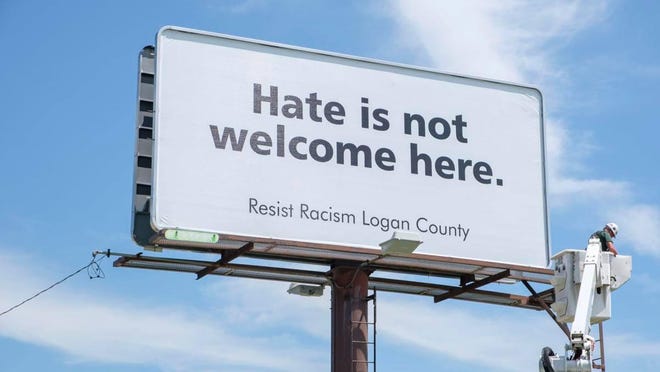 New billboard on Woodlawn Road tells travelers a point of view shared by the Resist Racism Logan County Facebook group.