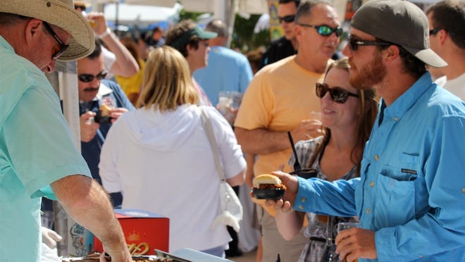Patrons at last year’s Naples Craft Beer Fest. This year’s event takes place March 7 at Bayside in Naples.